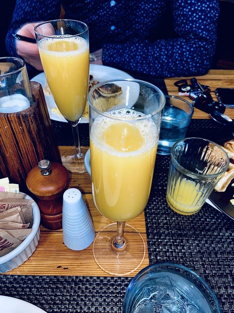 brunch foods and drinks on wooden table