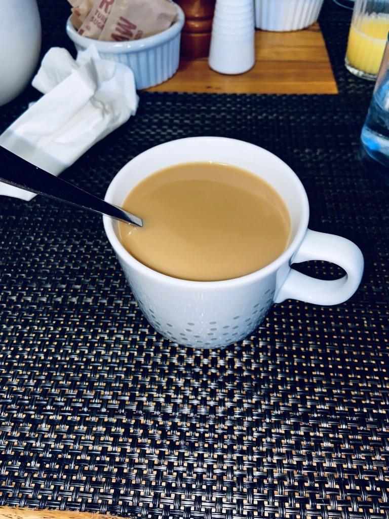 mug of coffee on table