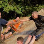 men in mud at Muddy ACCE Race